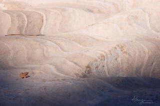 folds and curves in the sandstone along a wash in the Clear Creek area of Zion National Park, Utah