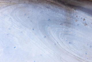 Colourful and interesting erosion patterns on the sandstone of the Clear Creek area in Zion National Park, Utah