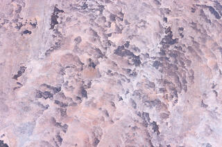 Colourful and interesting erosion patterns on the sandstone of the Clear Creek area in Zion National Park, Utah
