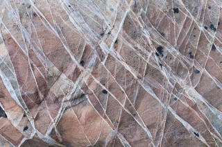 Colourful and interesting erosion patterns on the sandstone of the Clear Creek area in Zion National Park, Utah