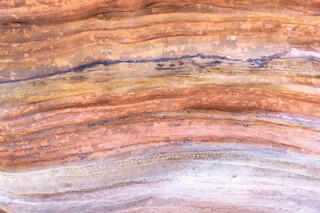 Colourful and interesting erosion patterns on the sandstone of the Clear Creek area in Zion National Park, Utah