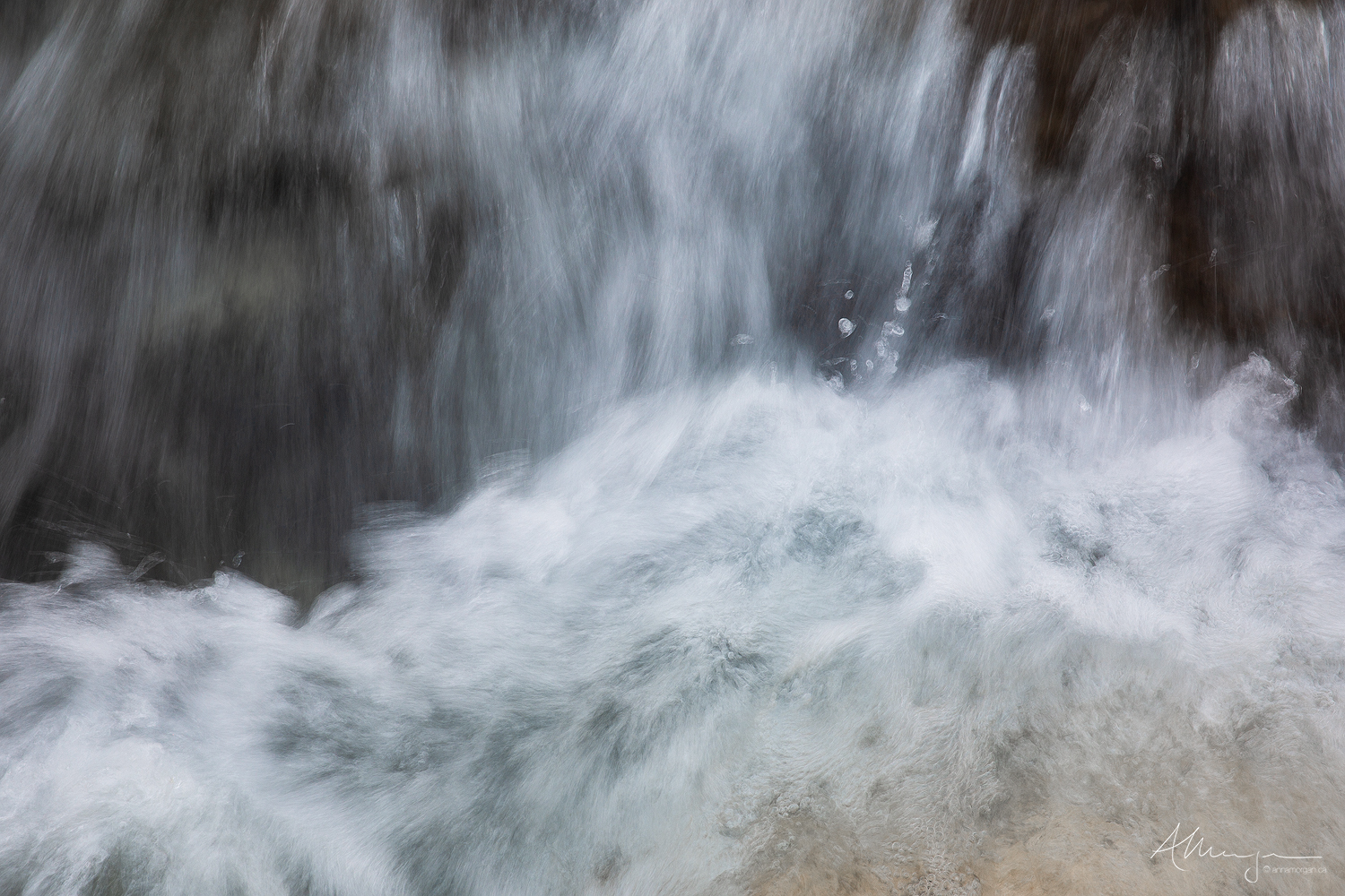 fast flowing glacial water detail from a river in Kootenay National Park, British Columbia 