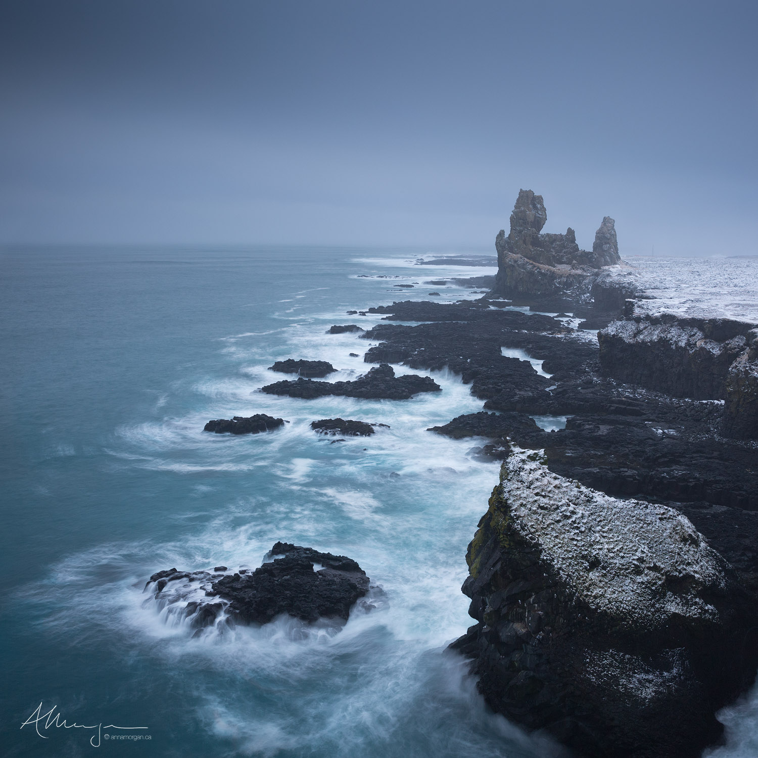 Spirit of Snæfell Winter waves batter the rocky cliffs at Arnarstapi on the Snaefellsness Peninsula in Iceland, eroding and shaping the coastline